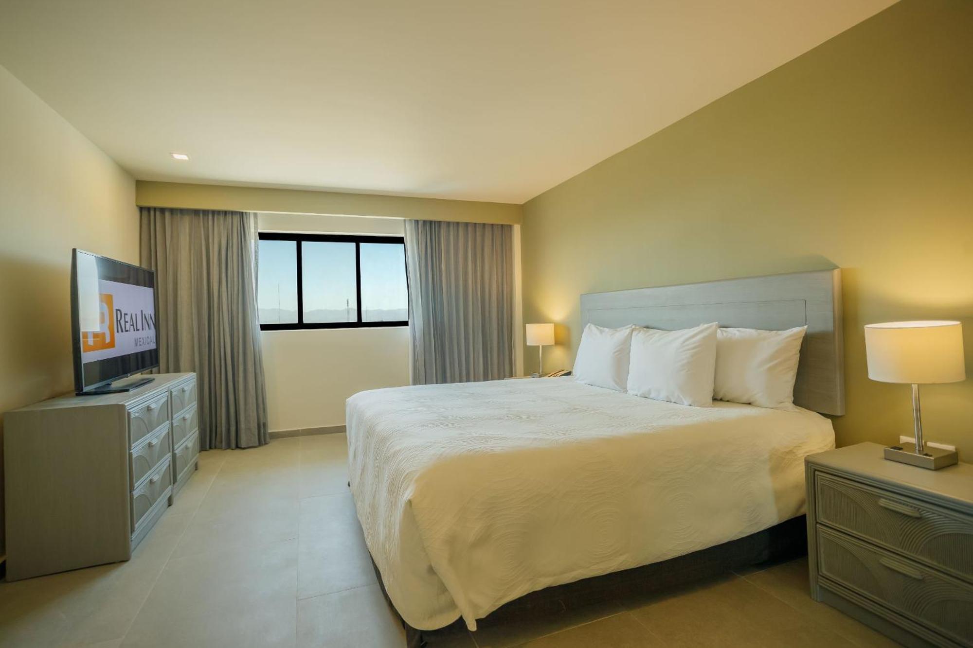 Real Inn Mexicali Exterior photo A bedroom at the hotel