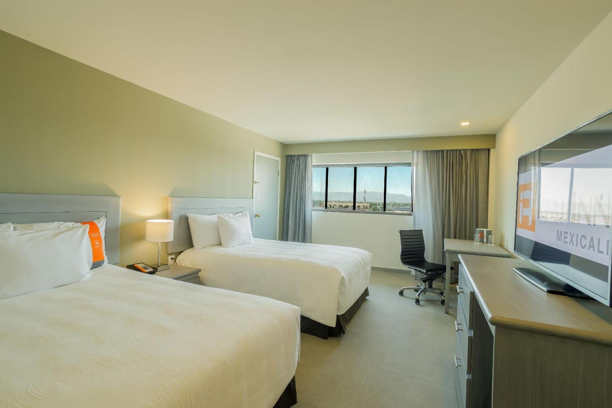 Real Inn Mexicali Exterior photo A room at the Hilton Garden Inn